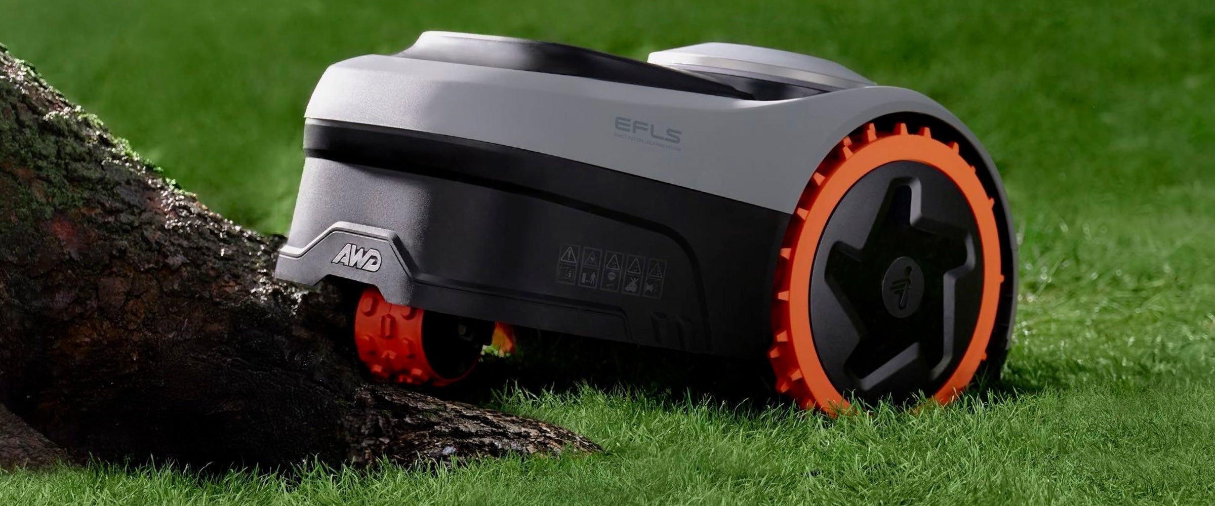 Navimow i110N robot lawn mower on a lush green lawn.
