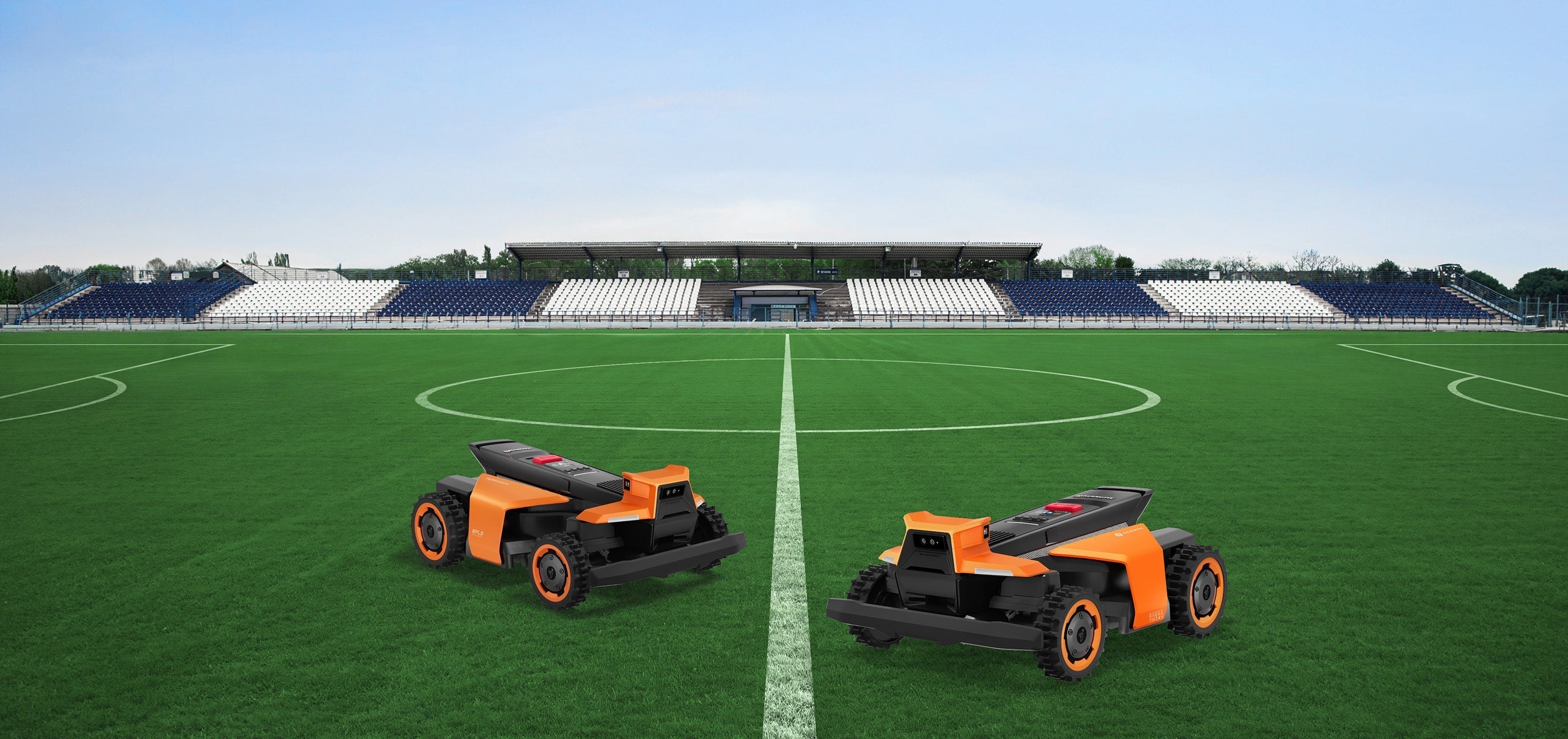 Segway Navimow H series robot lawn mower on soccer field.