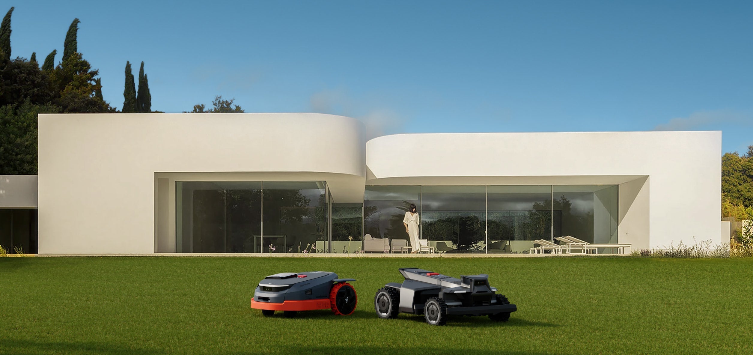 Navimow i110E and Navimow H3000E robot lawn mowers on grass.