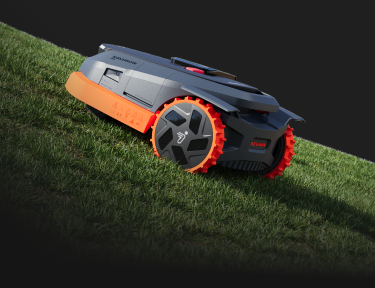 Navimow i Series robot lawn mower mows grass on hills.