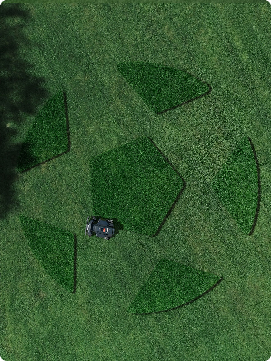 Navimow i110N robot lawn mower mows a grass soccer ball.