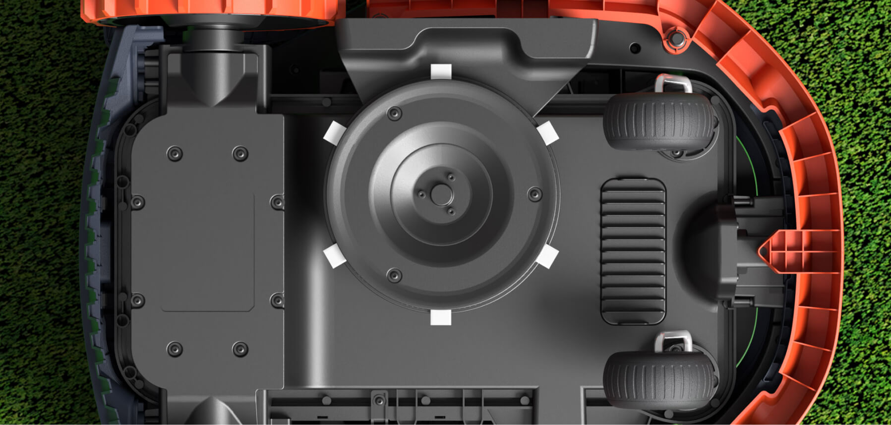 Navimow i105E robot lawn mower bottom view on the grass.