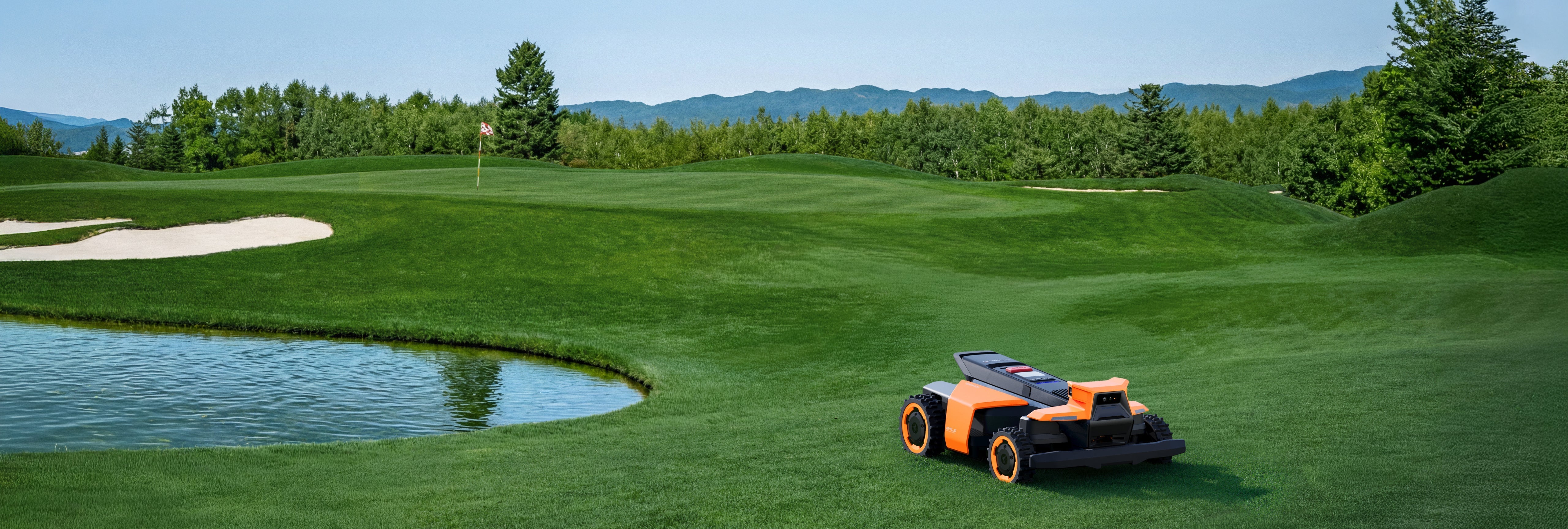 Segway Navimow i110N robot lawn mower on a golf course.