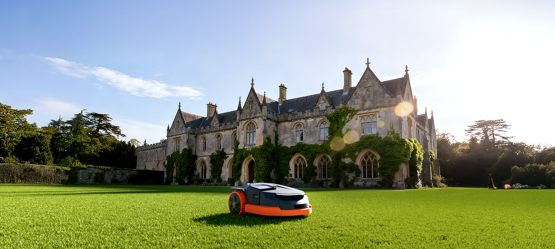 Navimow i105E robot lawn mower mows grass at the castle.