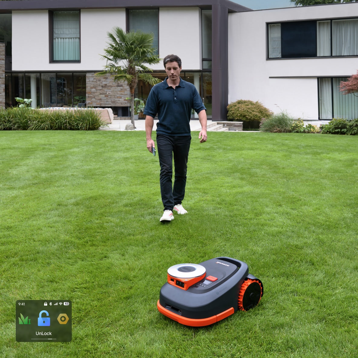 Navimow i110E robot lawn mower is mowing a lush lawn.