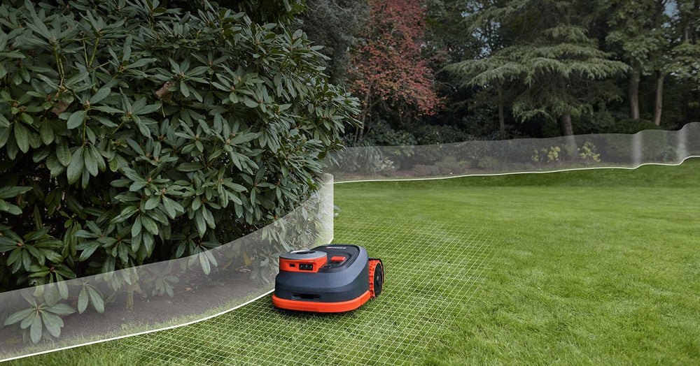 Navimow i110E robot lawn mower mows a lush green garden.