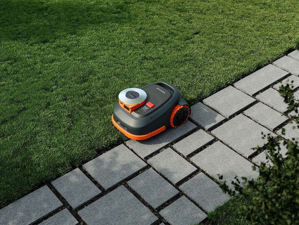 Segway Navimow i Series robot lawn mower on a lawn.