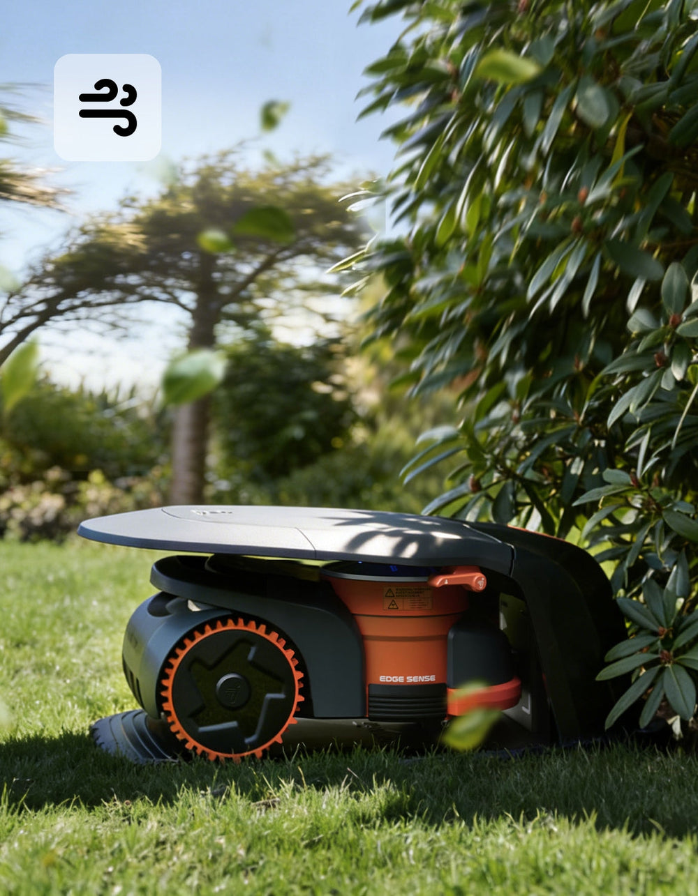 Navimow i110E robot lawn mower sits in the green garden.