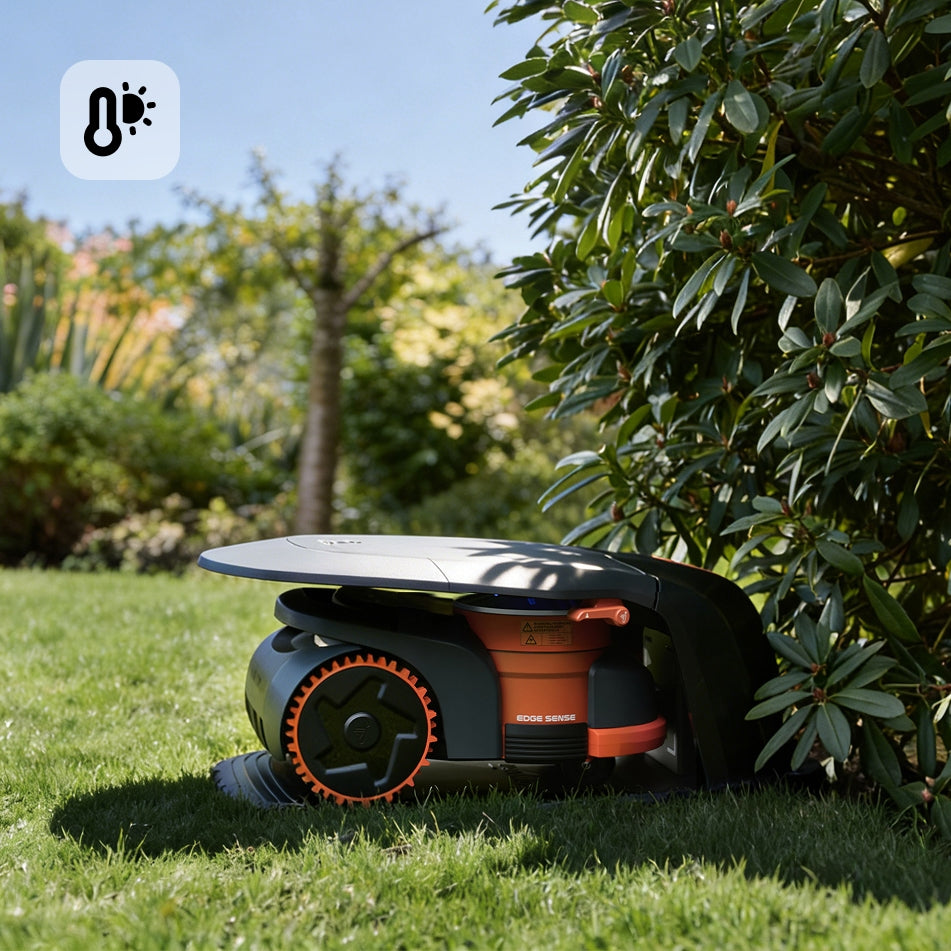 Navimow i105E robot lawn mower parked in the sunny grass.