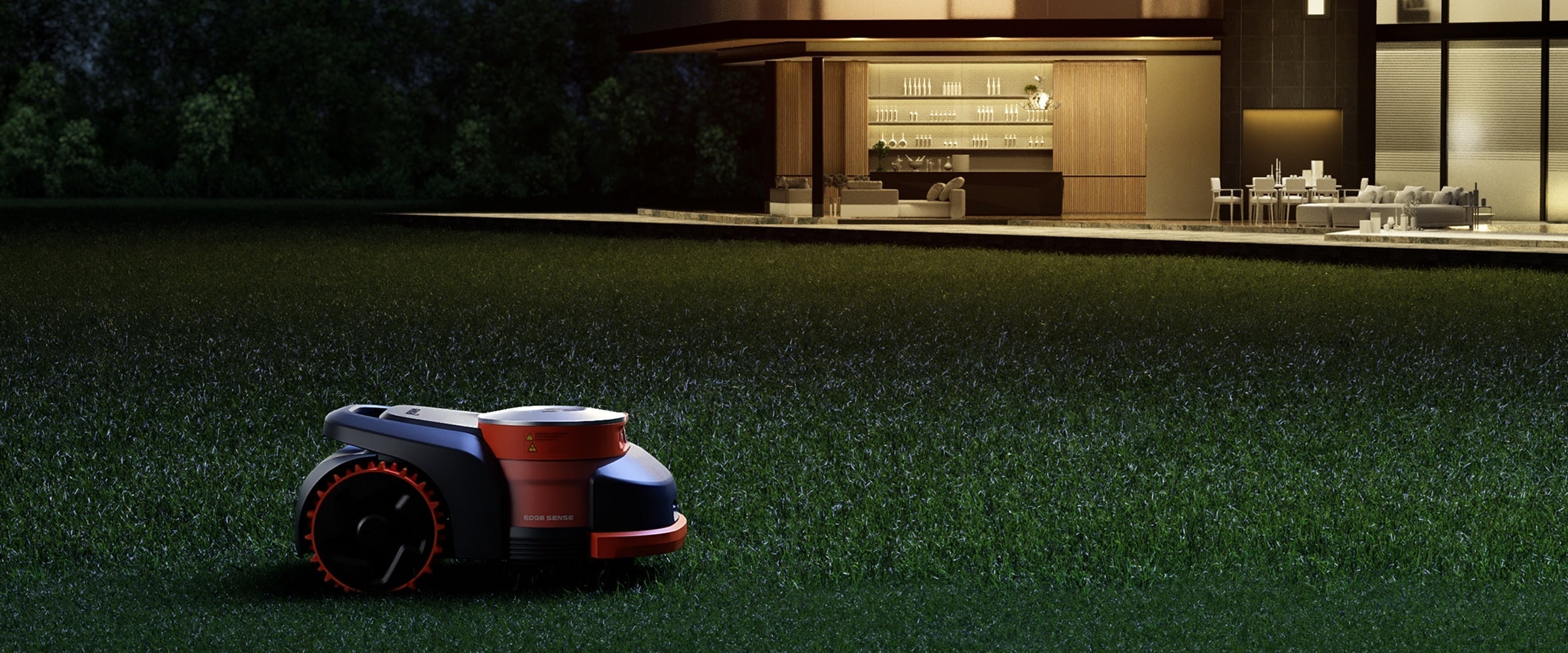 Segway Navimow i105E robot lawn mower on grass at night.