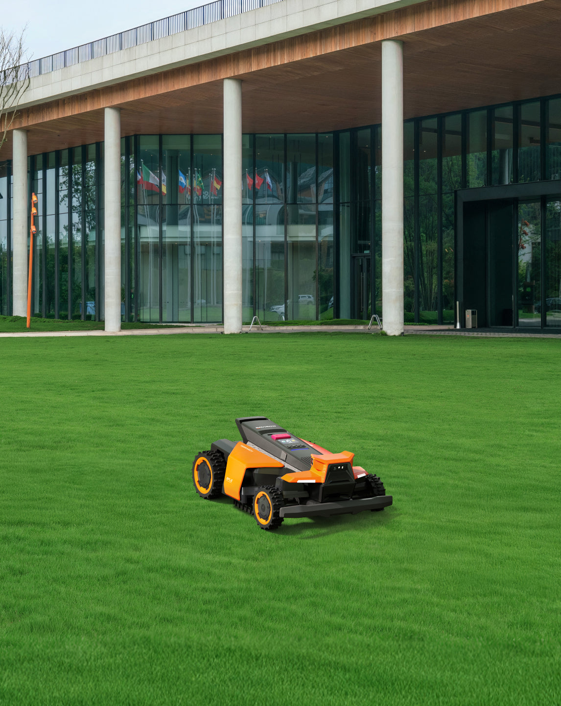 Navimow i105E robot lawn mower on a lush green lawn.