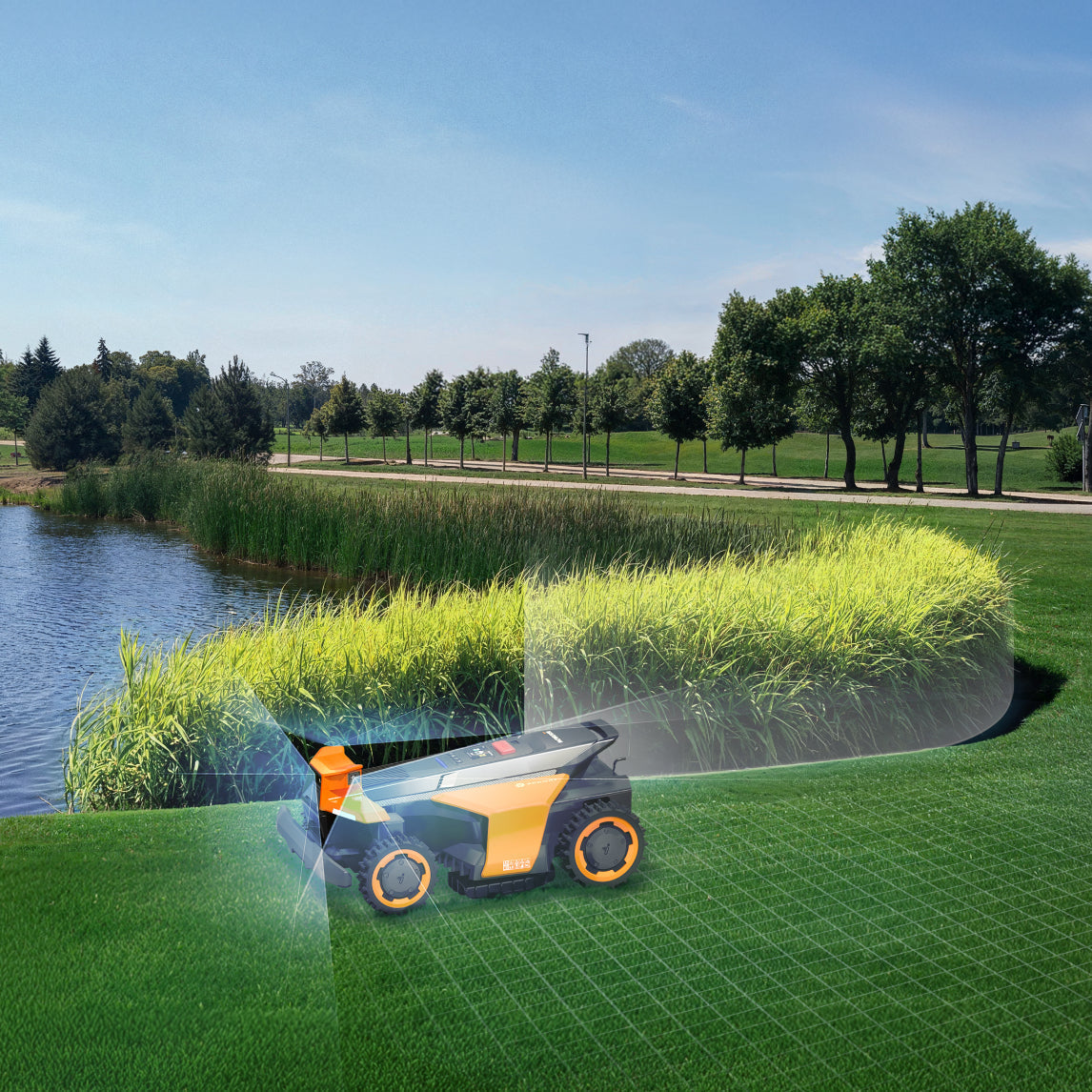 Navimow i110N robot lawn mower mows grass near a lake.