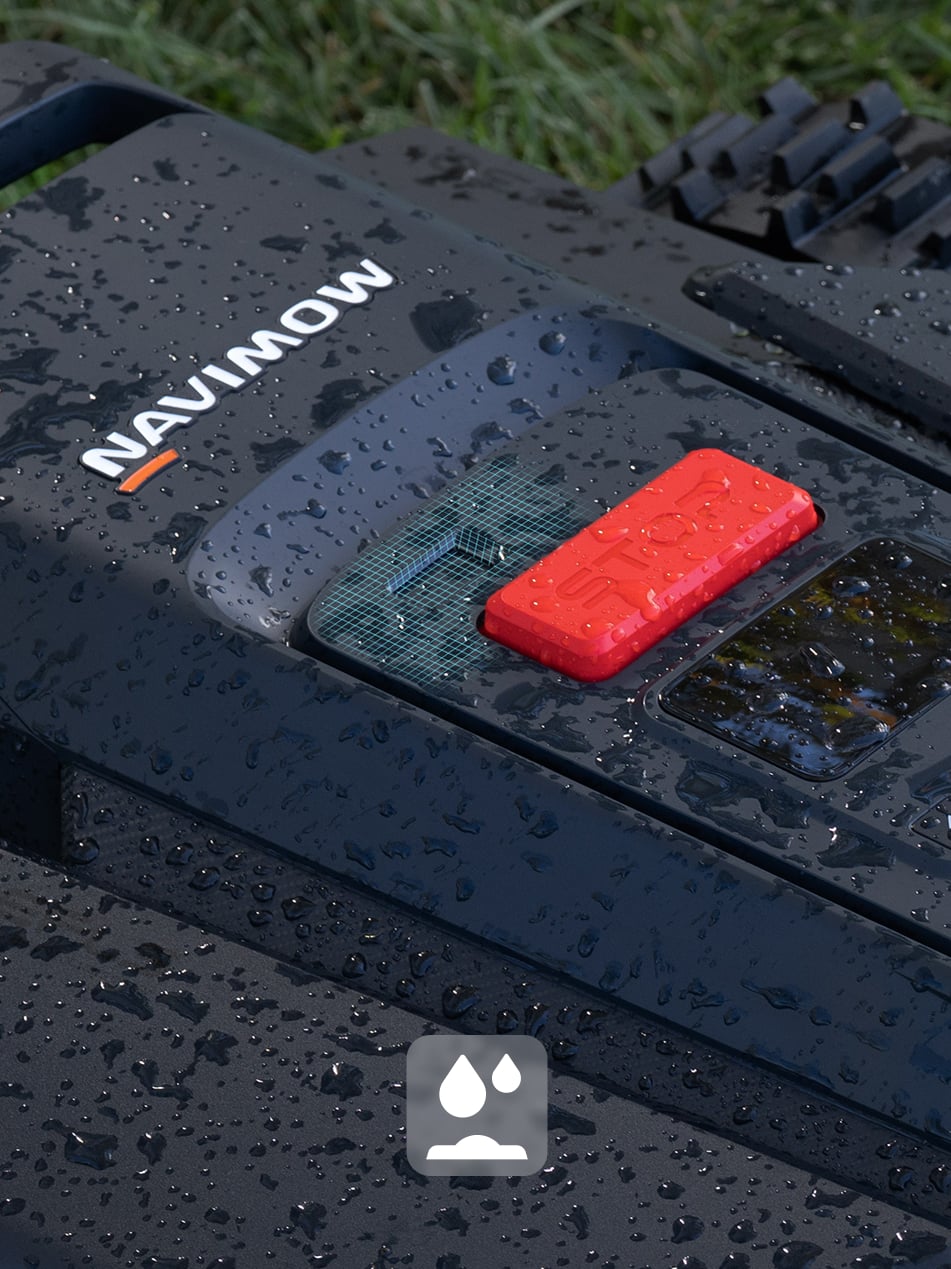 Navimow i110 robot lawn mower is wet from the rain.