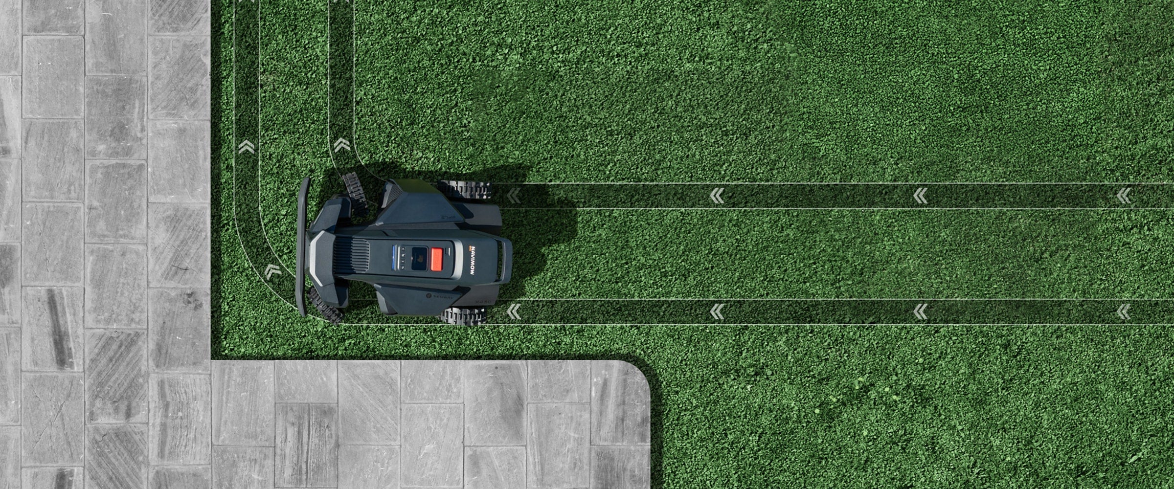 Navimow i105E robot lawn mower cuts the lush green grass.