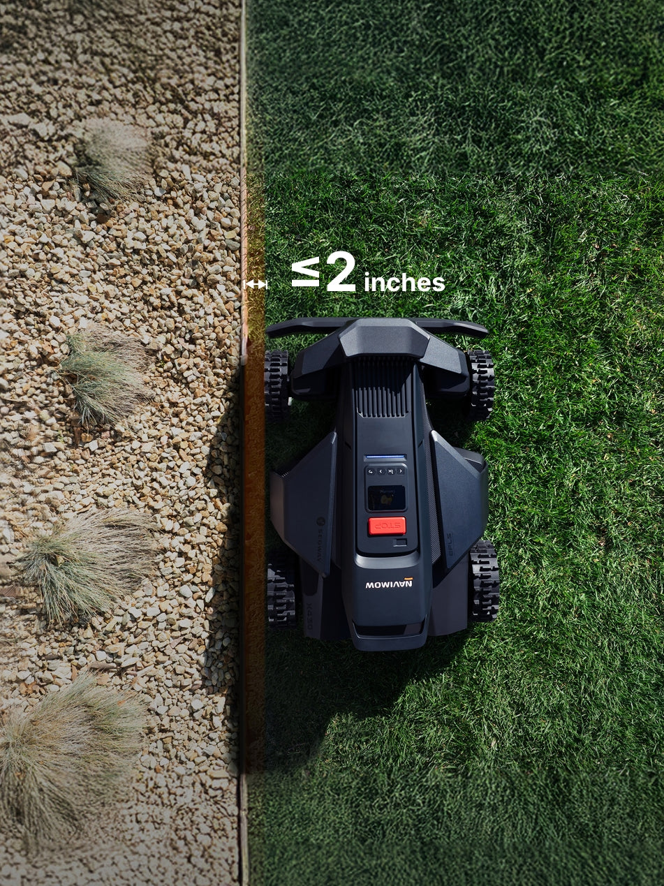 Navimow i110N robot lawn mower mows the green garden grass.