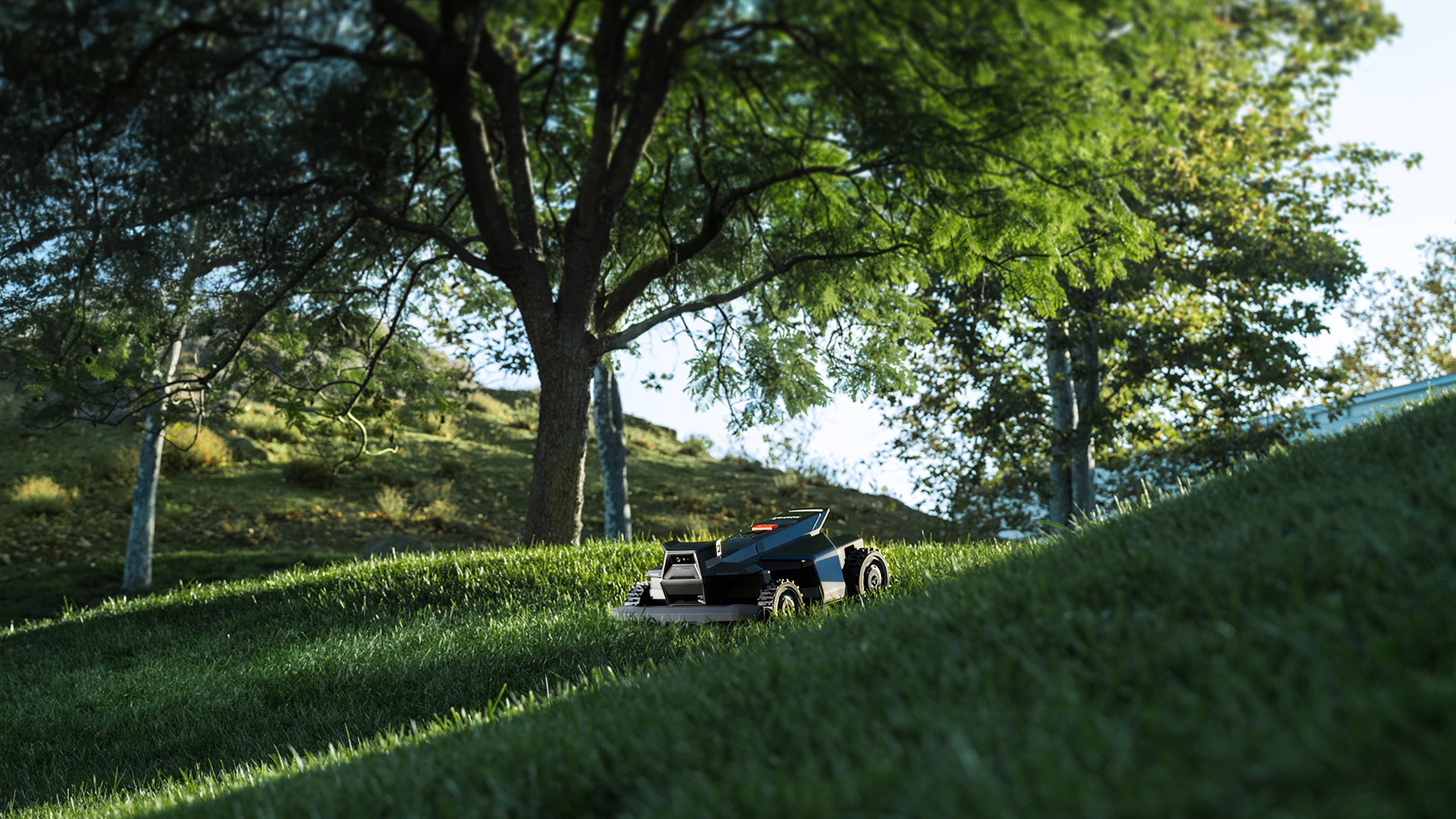 Segway Navimow i110N robot lawn mower on a grassy hill.