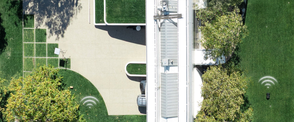 A Segway Navimow i110N robot lawn mower mows the lawn.