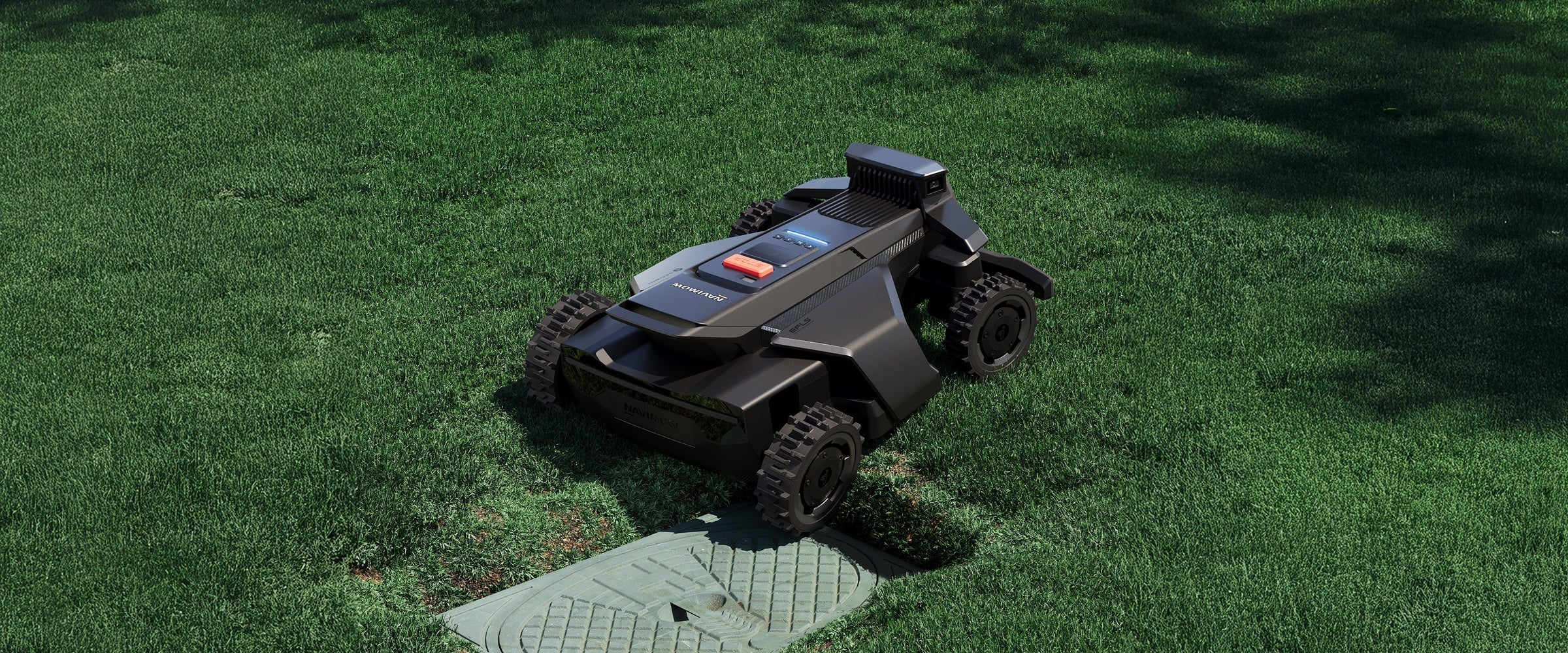 Navimow i Series robot lawn mower on a green lawn.